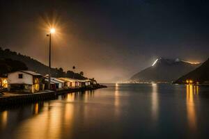 een nacht schot van een klein stad- Aan de water. ai-gegenereerd foto