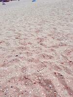 gouden strand zand in zomer foto