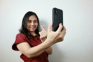 vrouw Holding smartphone, technologie bedrijf concept foto