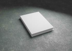 boek hardcover mockup met beton achtergrond foto