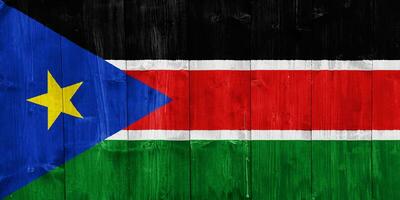 vlag van republiek van zuiden Soedan Aan een getextureerde achtergrond. concept collage. foto