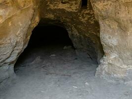 oude steen muren van de grot in Cappadocië, kalkoen foto