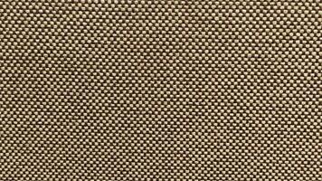 dichtbij omhoog detail van beige kleding stof textuur. beige linnen structuur achtergrond foto