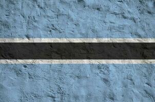 botswana vlag afgebeeld in helder verf kleuren Aan oud Verlichting bepleistering muur. getextureerde banier Aan ruw achtergrond foto