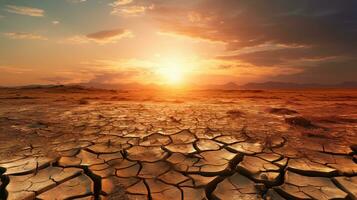 verbijsterend zonsondergang over- een droog uit veld. de gouden zon afgietsels een warm gloed over- de gebarsten aarde, creëren een dramatisch en mooi tafereel. generatief ai foto