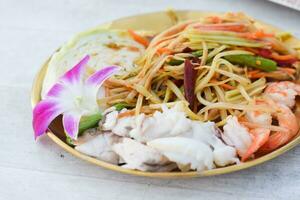 papaja salade, somtam Thais voedsel foto