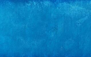 modern turkoois kalksteen structuur in blauw licht naad huis muur papier concept voor vlak Kerstmis breed achtergrond, terug beton tafel top vloer, muur papier graniet patroon, grunge naadloos oppervlakte foto
