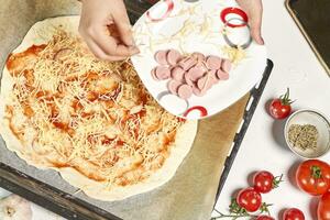 Koken huis gemaakt pizza foto