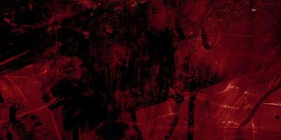 rode en zwarte horror achtergrond. donkere grunge rode textuur beton foto