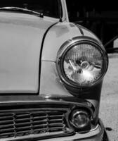 koplampen van klassieke auto's foto