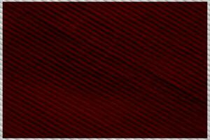 rood corduroy kleding stof structuur gebruikt net zo achtergrond. schoon kleding stof achtergrond van zacht en glad textiel materiaal. lap, fluweel, .luxe scharlaken toon voor zijde. foto