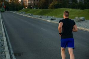 detailopname portret van atletisch Mens rennen foto