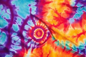 ai gegenereerd levendig tie-dye kleding stof structuur met wervelende kleuren. textuur, achtergrond, patroon foto