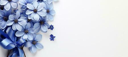 ai gegenereerd panoramisch blauw bloemen en zijde lint Aan wit achtergrond vlak leggen top visie samenstelling met kopiëren ruimte voor banier, kaart bruiloft foto