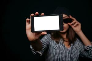 hipster meisje nemen afbeelding smartphone zelfportret, scherm visie foto