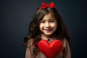 ai gegenereerd portret van een schattig weinig meisje met rood hart Aan valentijnsdag dag concept. foto