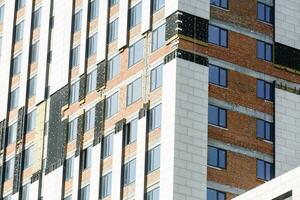 gebouw facade vernieuwing, huis wederopbouw, reparatie. foto