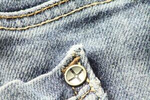 detailopname van blauw jeans en denim details. foto