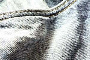 detailopname van blauw jeans en denim details. foto