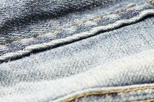 detailopname van blauw jeans en denim details. foto