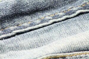 detailopname van blauw jeans en denim details. foto