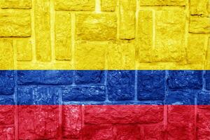 vlag van republiek van Colombia Aan een getextureerde achtergrond. concept collage. foto