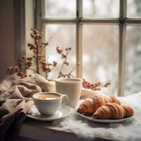 ai gegenereerd knus weekend gevoel met stomen koffie, croissants, en een besneeuwd venster backdrop foto