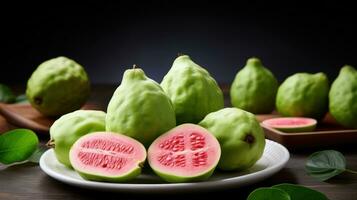 ai gegenereerd guava fruit Aan zwart achtergrond. geheel en helften. groen Pel, rood vlees. exotisch tropisch fruit. gezond veganistisch nagerecht. macro. biologisch eco. voedsel blog, winkel, supermarkt, restaurant. foto