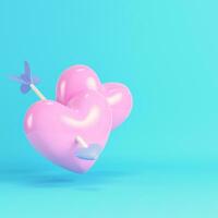 roze twee hart doorboord door Cupido pijl Aan helder blauw achtergrond in pastel kleuren foto