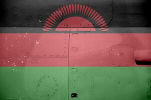 Malawi vlag afgebeeld Aan kant een deel van leger gepantserd helikopter detailopname. leger krachten vliegtuig conceptuele achtergrond foto