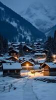 ai gegenereerd alpine dorp Bij nacht in winter. ski toevlucht in Alpen foto