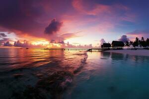 ai gegenereerd Maldiven zonsondergang strand paradijs met kleurrijk luchten, water villa's, en kalmte foto