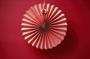 ai gegenereerd de origami ventilator hangende Aan een roze achtergrond, foto