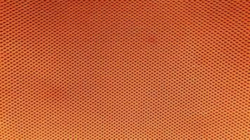 oranje nylon stof patroon textuur achtergrond. foto