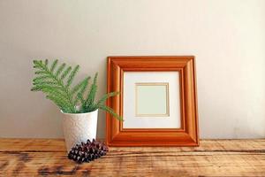 houten frame mockups met houten achtergrond foto