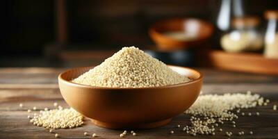 ai gegenereerd quinoa in kom Aan houten keuken tafel. foto