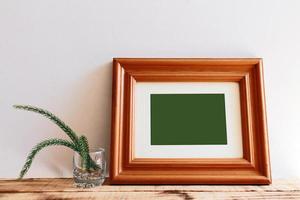 houten frame mockups met houten achtergrond foto