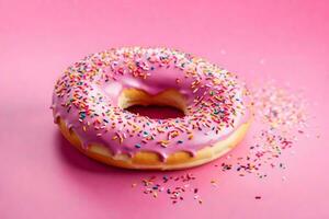 ai gegenereerd een donut met roze glimmertjes en hagelslag Aan een roze achtergrond foto