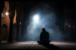 ai gegenereerd silhouet moslim Mens bidden n de moskee foto