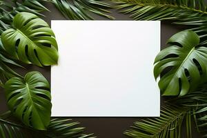 ai gegenereerd mockup wit blanco papier vel met groen tropisch bladeren top visie Aan grijs achtergrond, sjabloon leeg kaart vlak leggen voor ontwerp met kopiëren ruimte foto