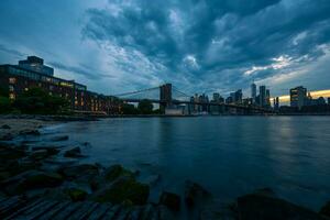 Manhattan Bij zonsondergang foto