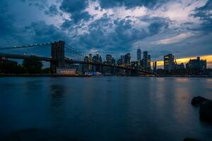 Manhattan Bij zonsondergang foto