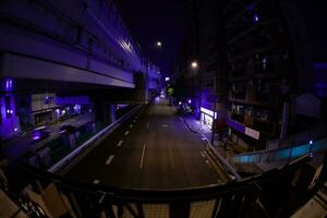 een nacht verkeer Bij de stad straat in tokyo vis oog schot foto