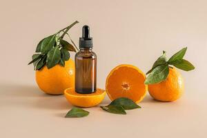 kunstmatig fles met een druppelaar met een hydraterend serum voor gezicht en lichaam huid zorg gebaseerd Aan mandarijn- extract tussen rijp vruchten. vitamine c. model. foto