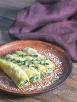 canelloni gevuld met Ricotta en spinazie foto