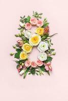 maart 8e concept. creatief lay-out gemaakt van kleurrijk roos bloemen Aan roze achtergrond. groet kaart vrouwen dag Aan maart 8e foto