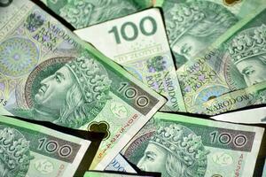 achtergrond gemaakt van Pools geld bankbiljetten foto