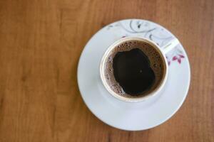 een kop van Turks koffie Aan tafel foto