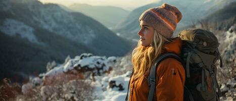 ai gegenereerd foto van een vastbesloten vrouw bergbeklimmer trekking door besneeuwd wildernis, belichamen de geest van avontuur en vrijheid.