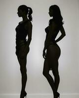 ai gegenereerd silhouet van drie Dames in zwart en wit jurken, studio schot. ai generatief foto